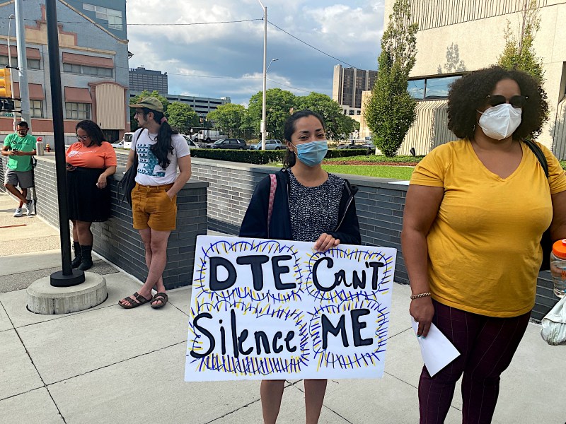 Protesters outside a Michigan PSC hearing